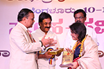 Noted Singer Sangeetha Katti being felicitated by Educationist Dr. Wooday P. Krishna and Justice Dr. N. Kumar, 2016.