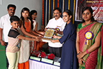 Educationist Dr. Wooday P. Krishna felicitating academic achievers on the occasion of annual day celebration of Seshadripuram Main Pre-University College, 2016. Also seen are Shri S. Viswanath and Smt. Shobha S.