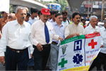 Participating in a Walkathon to create awareness on misuse of Red Cross Emblem.