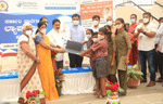Distribution of free laptops to governmnet school students sponsored by the seshadripuram educational trust, bangalore, th july 2021. Honrary general secretary Dr Wooday P Krishna with Karnataka Deputy Cheidf Minister Dr C N Aswathnarayana and others were present in the occasion
